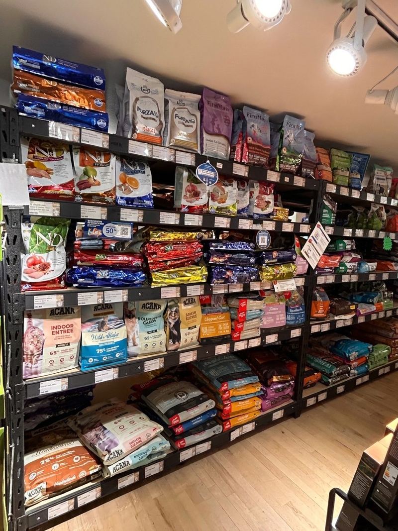 Shelves of premium dog and cat food bags